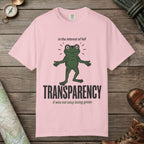 Blossom color unisex graphic t-shirt with "Transparent About It Frog" design