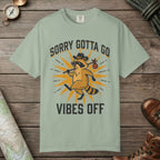 Bay color unisex graphic t-shirt with "Vibes Off Raccoon" design