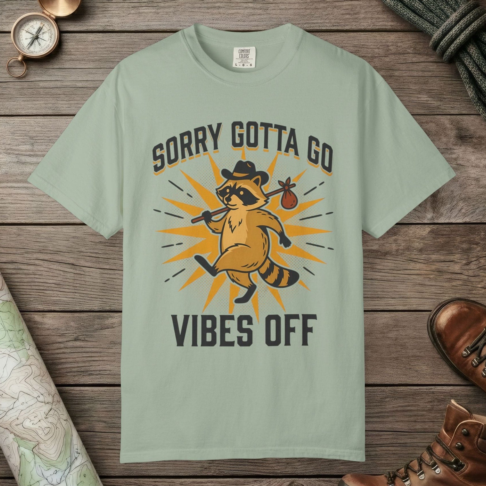Bay color unisex graphic t-shirt with "Vibes Off Raccoon" design