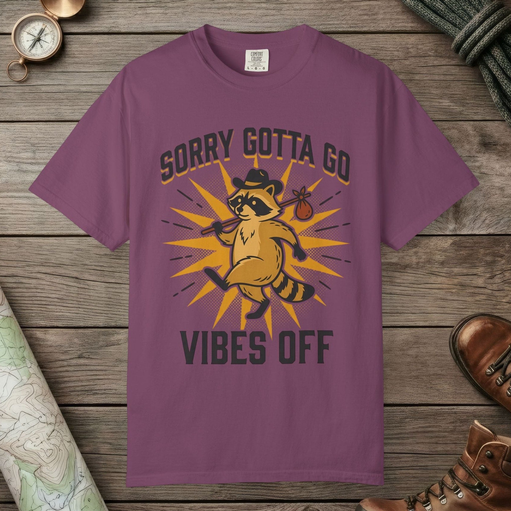 Berry color unisex graphic t-shirt with "Vibes Off Raccoon" design