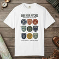 White color unisex graphic t-shirt with "Vintage Trail Patches" design