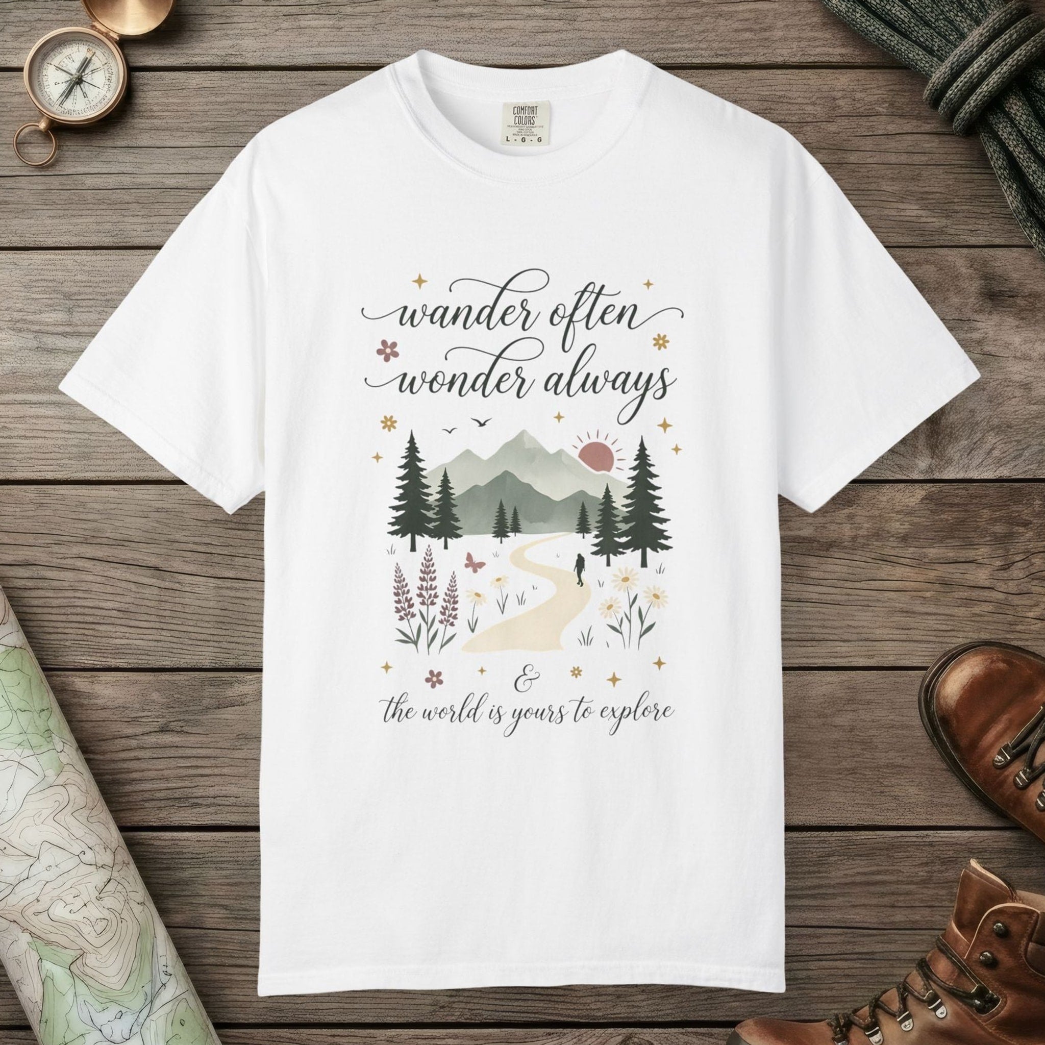 White color unisex graphic t-shirt with "Wander Often" design