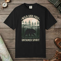 Black color unisex graphic t-shirt with "Wild And Free" design