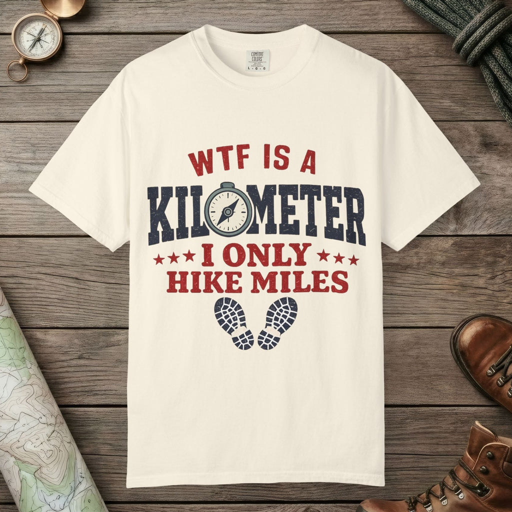 Ivory color unisex graphic t-shirt with "WTF Is a Kilometer" design