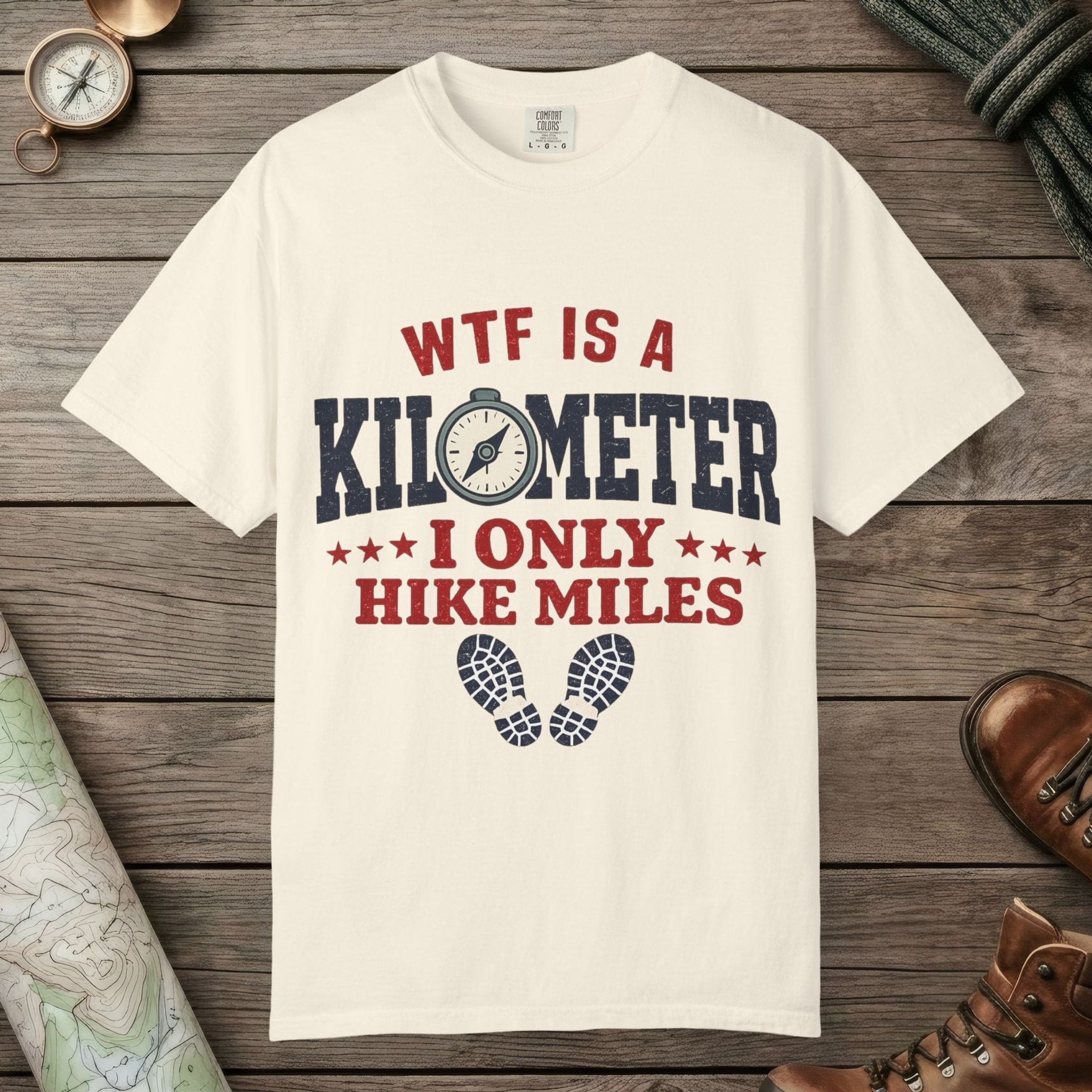 Ivory color unisex graphic t-shirt with "WTF Is a Kilometer" design