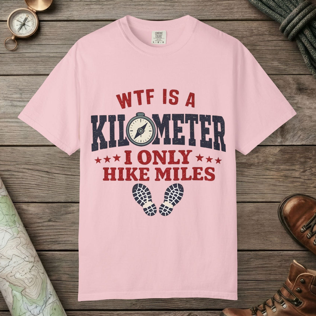 Blossom color unisex graphic t-shirt with "WTF Is a Kilometer" design