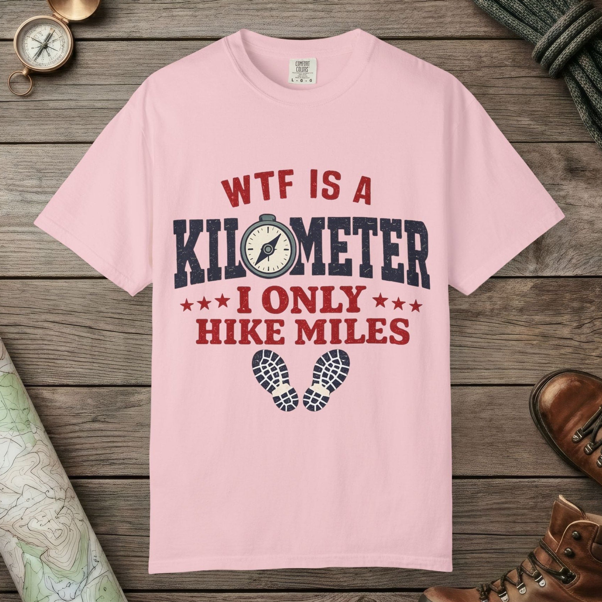 Blossom color unisex graphic t-shirt with "WTF Is a Kilometer" design
